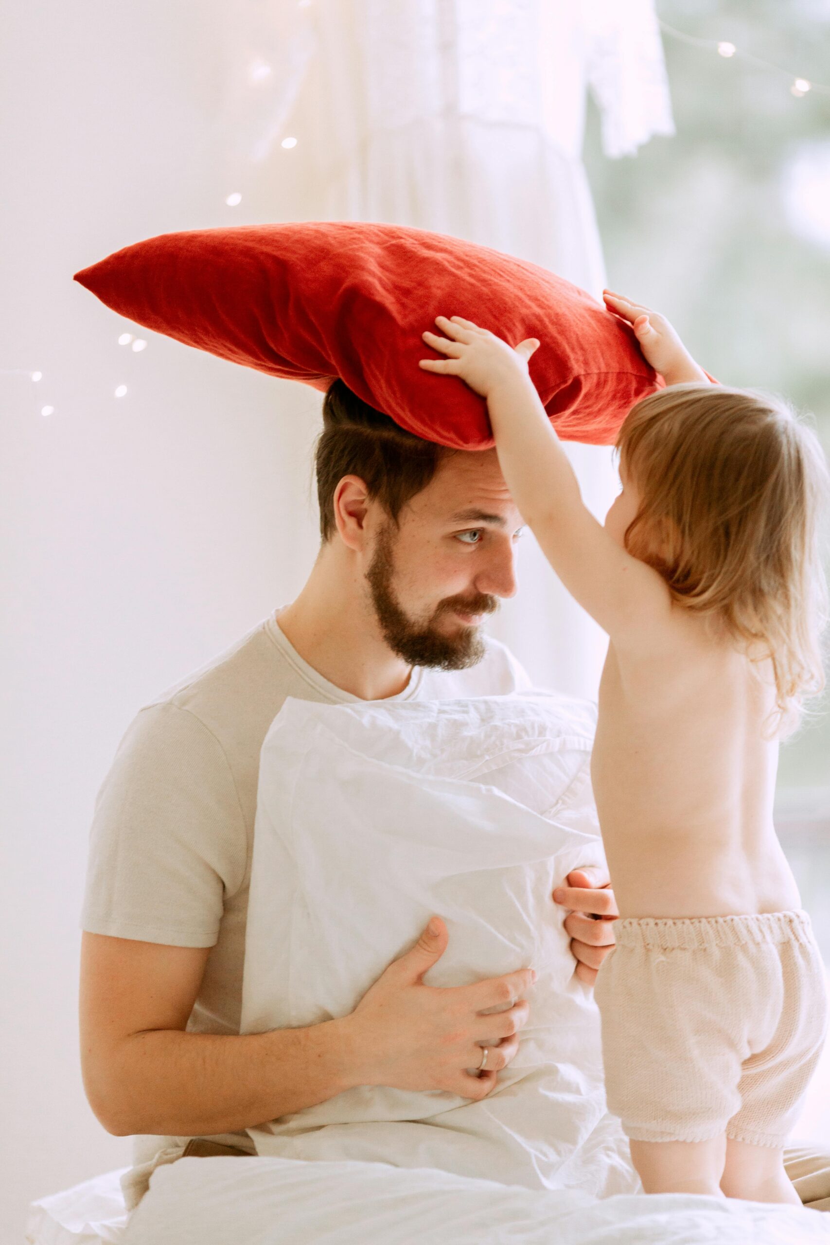 Father and child at home representing individual and family health insurance